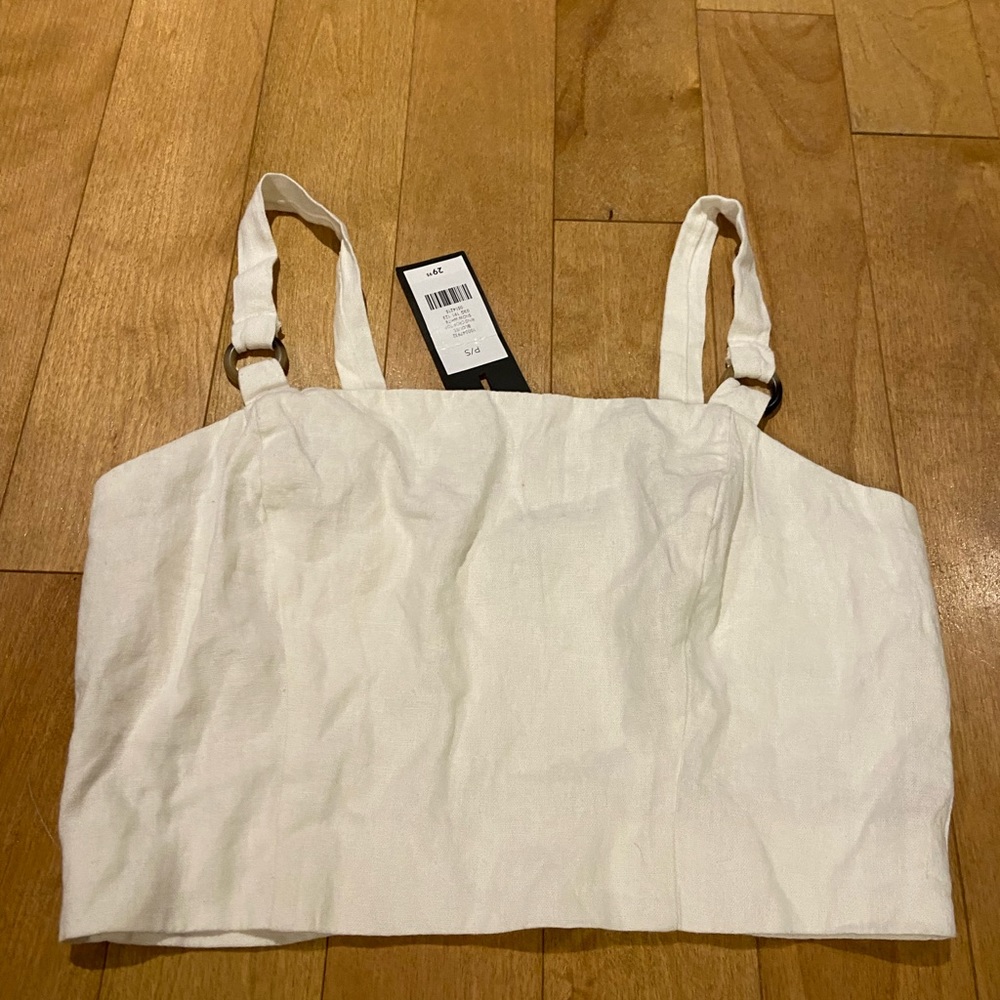 Very flattering crop top.  Size small